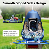 A vibrant Blue Jay perched on a bright red Nafnti smart bird feeder, creating a sharp color contrast against the lush green garden background.